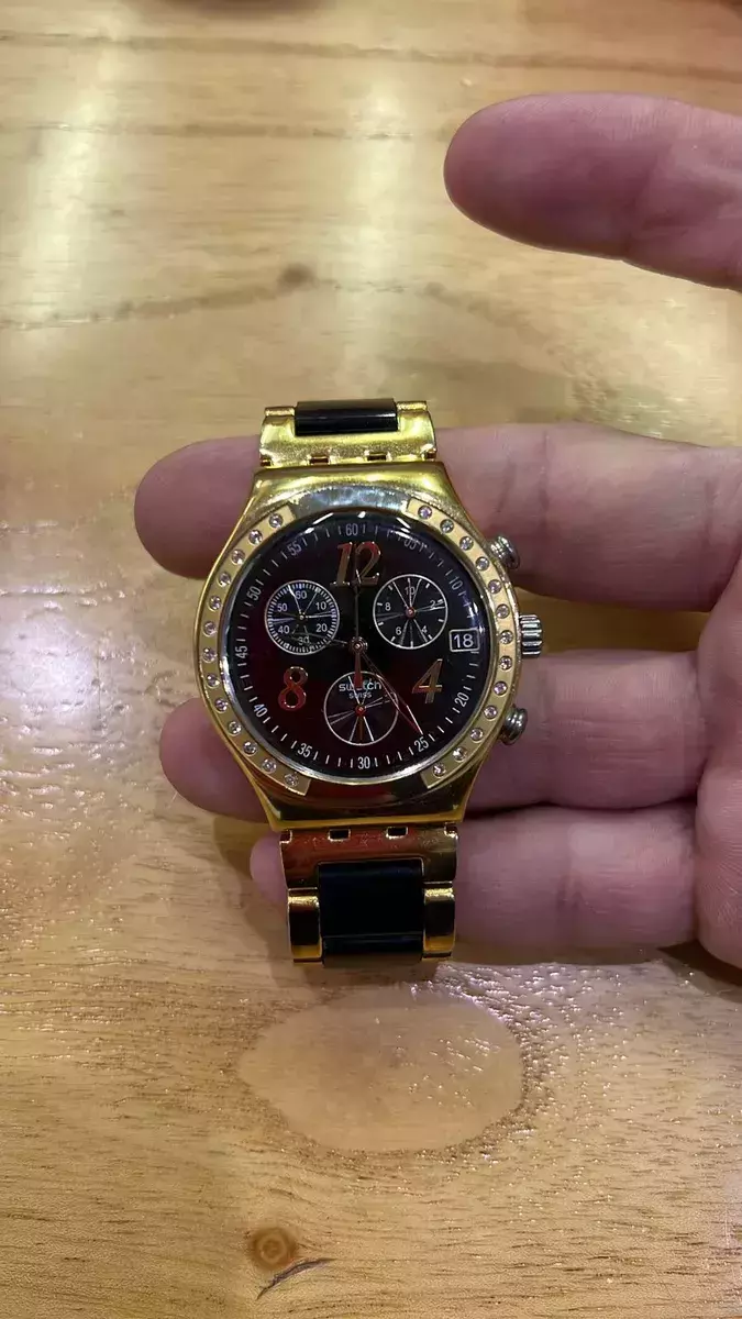 Reloj Swatch Ycg405g Dreamnigth Gold USADO