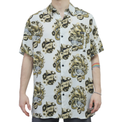 Camisa Santa Cruz Botanic Skull Areia. Confeccionada em 100% viscose. Fechamento com botões. Bolso do lado esquerdo na altura do peito.