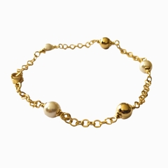 Pulsera Laminada en Oro con Perlas y Bolitas Lisas - comprar online