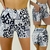 1050. Calza short con bolsillo PRINT GRIS