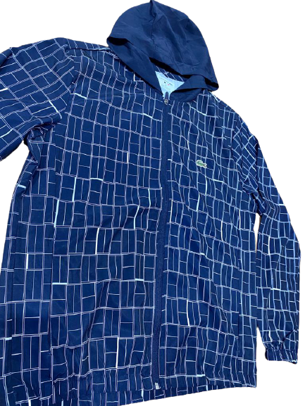 Blusa lacoste corta vento sale