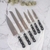Set de cuchillos profesionales mango negro con taco - comprar online