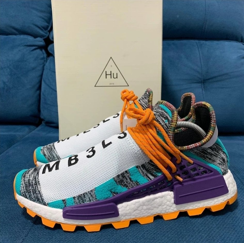 Nmd hu pharrell solar pack orange shop
