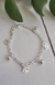 Pulsera acero blanco con dijes “ojitos” - comprar online