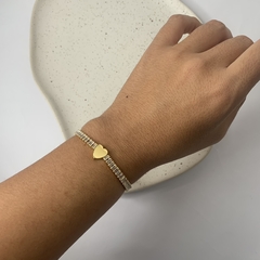 PULSEIRA REGULÁVEL RIVIERA BAGUETE COM CORAÇÃO DOURADO