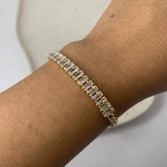 PULSEIRA ELOS COM ZIRCÔNIA BAGUETE DOURADO na internet