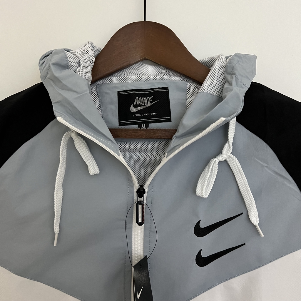 Corta vento 2025 cinza nike