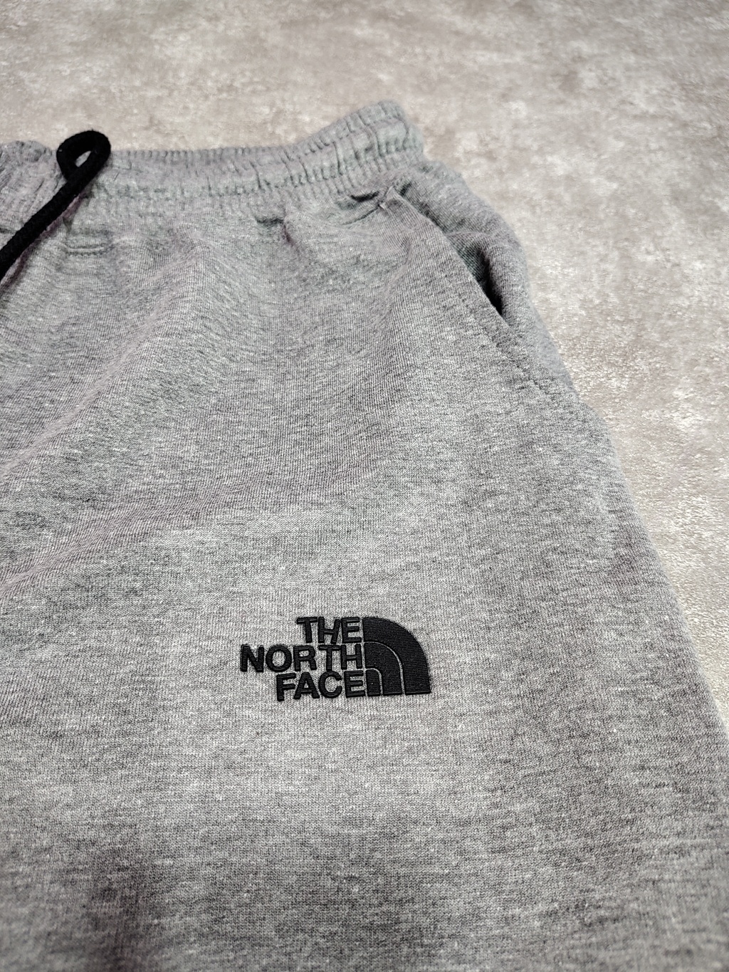 Pantalon jogging The North Face gris SKU P400
