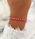 Pulsera roja bolitas acero blanco - comprar online