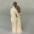 Escultura de Casal com Menino 10 cm na internet