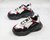 BALENCIAGA Triple S Black/Red/White - comprar online