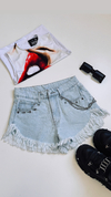 Short jeans desfle cadenita y tachas