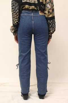 Calça jeans cintura alta western trançado couro barra - Capichó Brechó