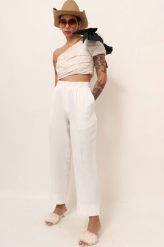 calça estilo linho cintura alta branca na internet