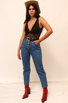 Calça jeans cintura alta botões vintage na internet