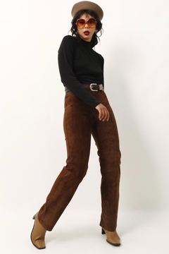 calça couro com malha marrom cintura alta na internet