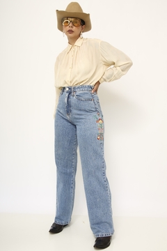 Calça jeans bordado cintura alta na internet