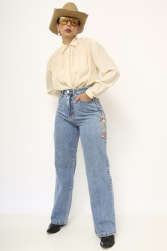 Calça jeans bordado cintura alta