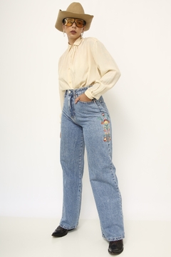 Calça jeans bordado cintura alta na internet