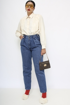 Calça jeans YSL vintage na internet