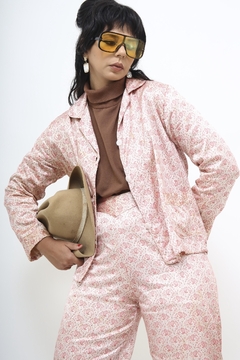 Conjunto de pijama rosa estampado calça + blusa na internet