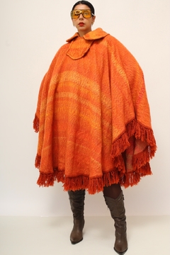 Poncho laranja franjas vintage na internet