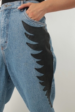 Calça jeans recorte couro vintage 90’s na internet