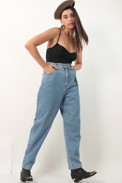 Calça jeans recorte couro vintage 90’s na internet
