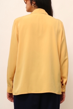 Camisa amarela classica amarela ombreira na internet