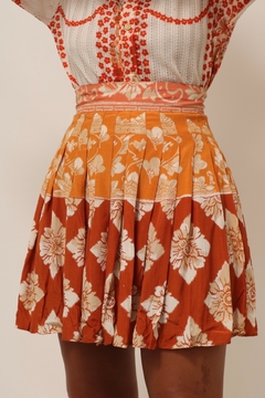 Imagem do Mini saia viscose pregas estampada laranja vintage