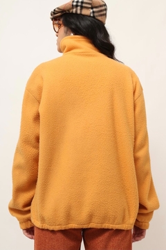 Blusa plush amarela ziper bordado - comprar online