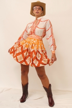 Mini saia viscose pregas estampada laranja vintage na internet