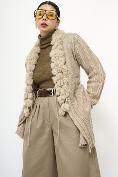 Cardigan tricot com recortes pelo na internet