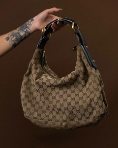 Bolsa Gucci Monogram na internet