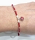 Pulsera plata ojito rojo