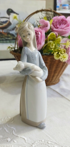 Imagen de Figura de porcelana Lladro España Niña con chanchito