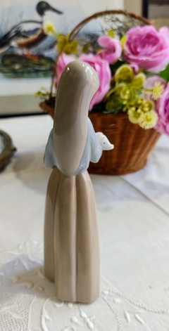 Figura de porcelana Lladro España Niña con chanchito - comprar online
