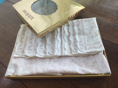 Mantel redondo con 8 servilletas marca Dalmata modelo Gioia en caja original usado en internet