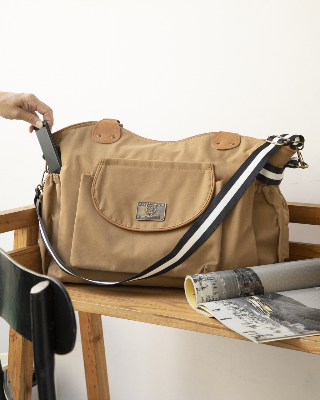 Bolso maternal best sale cuero