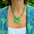 Green fused glass necklace with leather cord