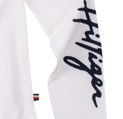 Remera "Tommy Hilfiger". Blanca con logo lentejuelas, manga larga en internet