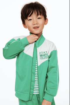 Campera "H&M". Little Boy- Tela deportiva verde y blanca con frisa en internet