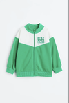 Campera "H&M". Little Boy- Tela deportiva verde y blanca con frisa