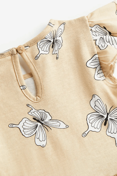 Vestido H&M - Little girl - De algodón beige con mariposas blancas y negras - comprar online