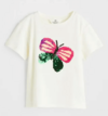 Remera H&M - Little Girl - Cruda con mariposa lentejuelas reversibles