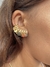 Brinco ear cuff de plaquinhas banhado a ouro 18k na internet