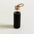 Botella de vidrio con tapa de bambú y funda de silicona | Negra - comprar online