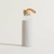 Botella de vidrio con tapa de bambú y funda de silicona | Crema
