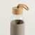 Botella de vidrio con tapa de bambú y funda de silicona | Visón en internet