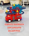 Camión de bomberos con circuito de patitos